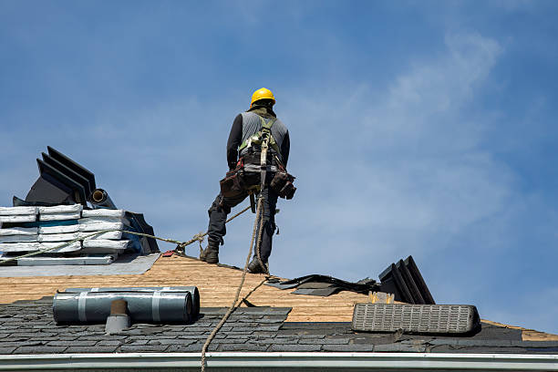 Professional Roof Replacement technician working in Manlius, NY